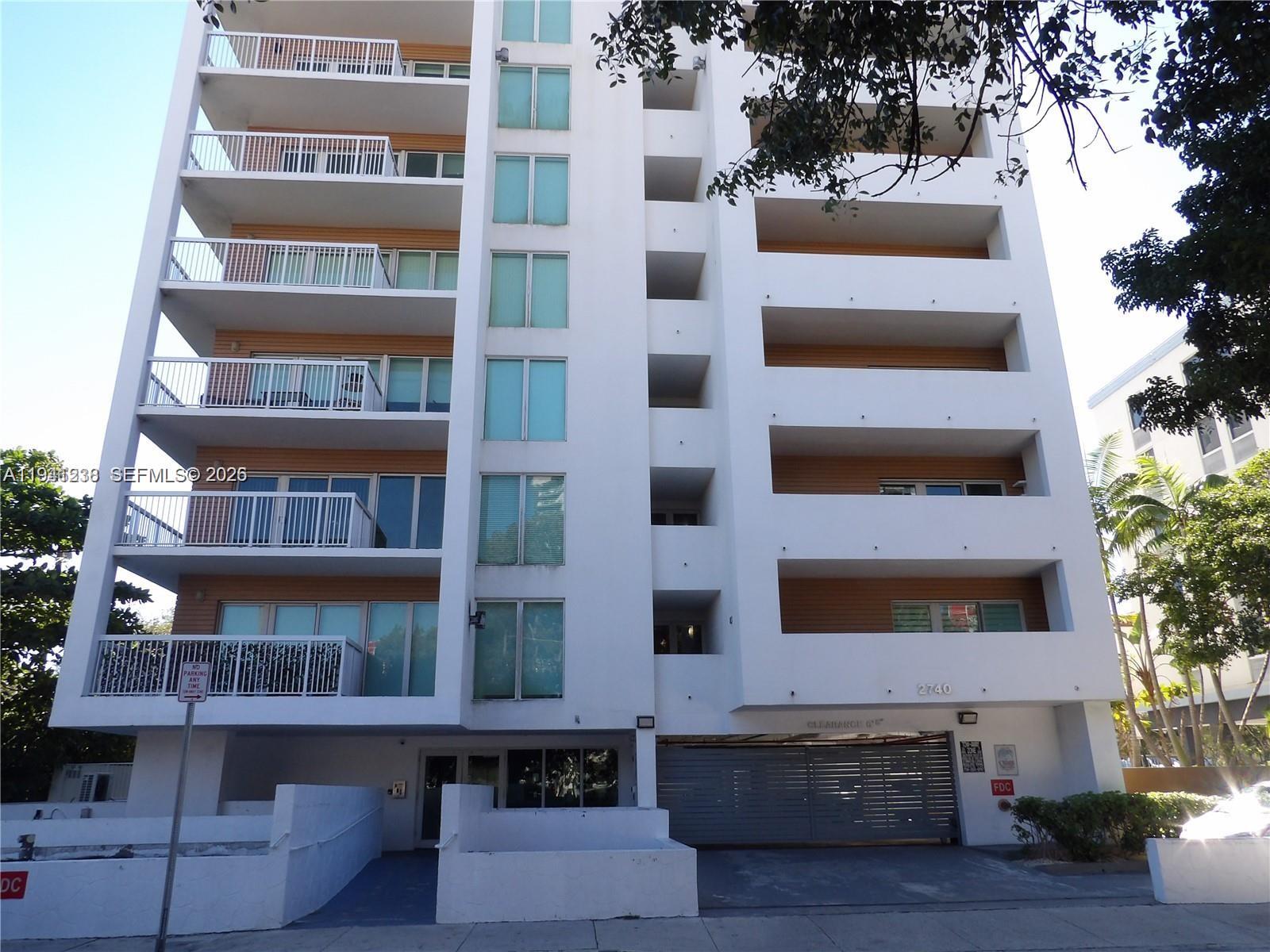 2740 Southwest 28th Terrace, Unit 507 Miami, FL 33133 - Photo 1 of 29 a front view of a building