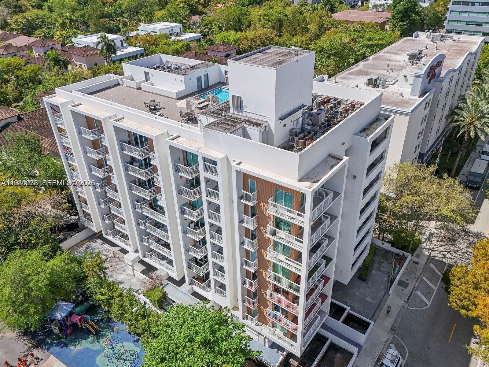 2740 Southwest 28th Terrace, Unit 507 Miami, FL 33133 - Photo 3 of 29 an aerial view of a building with garden space and street view