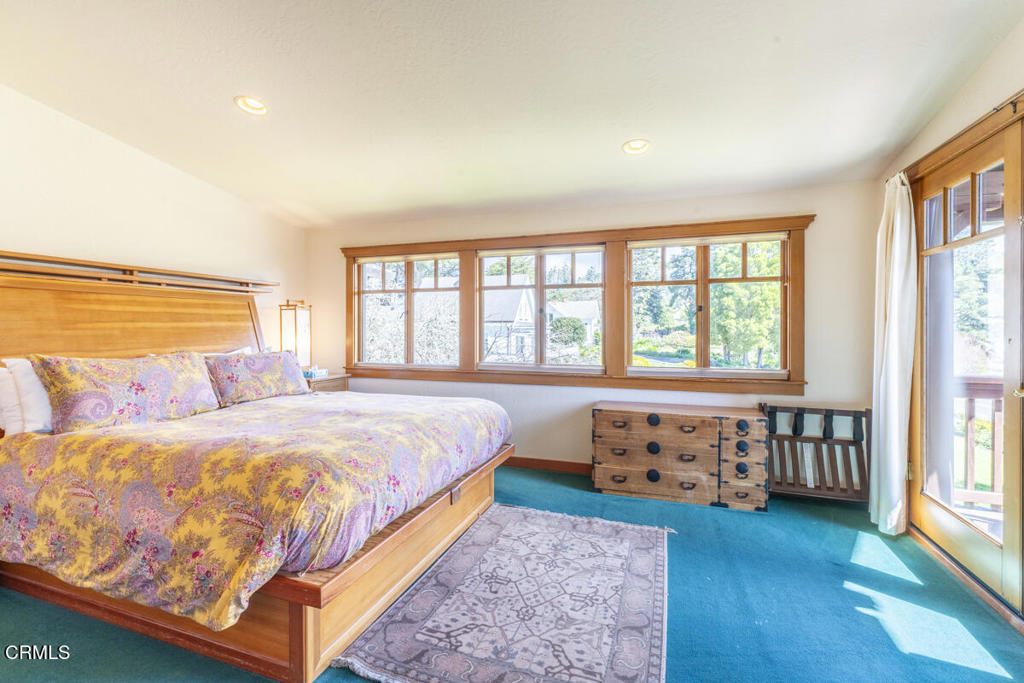 44920 Little Lake Road Mendocino, CA 95460 - Photo 28 of 62 a bedroom with a bed and a large window
