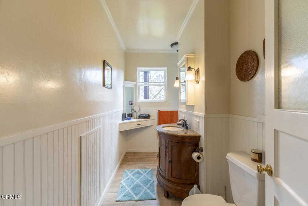 44920 Little Lake Road Mendocino, CA 95460 - Photo 48 of 62 a bathroom with a toilet a sink and a mirror