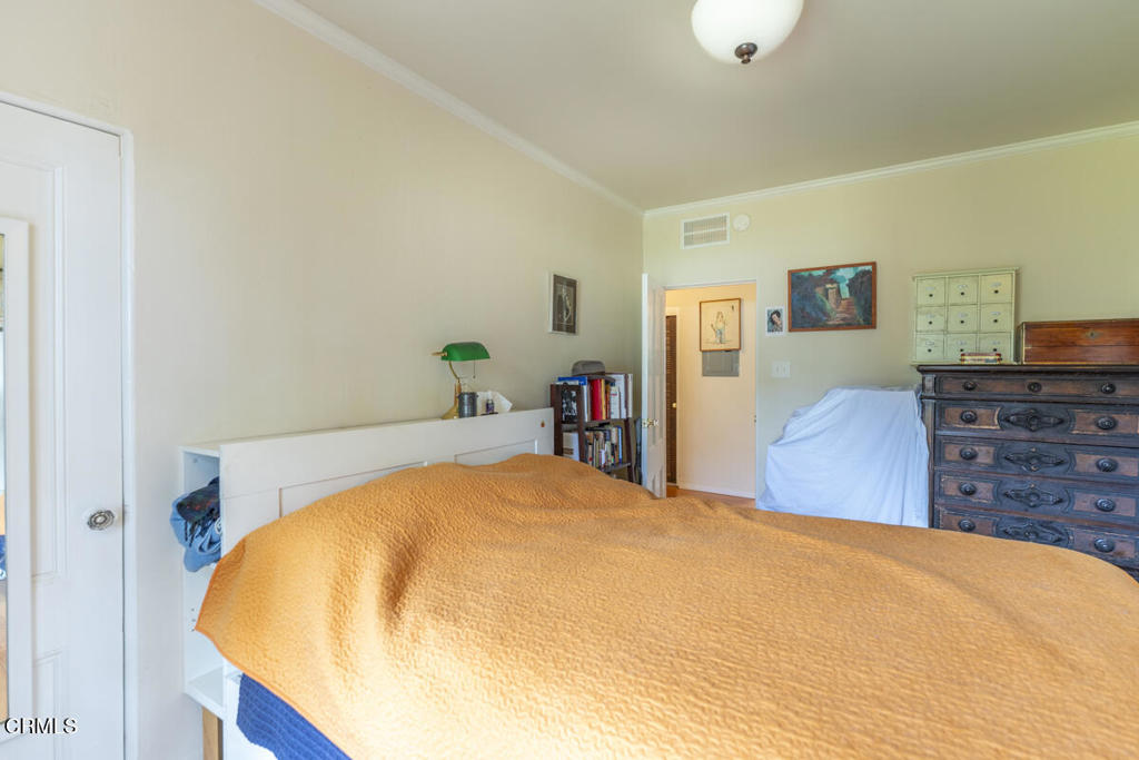 44920 Little Lake Road Mendocino, CA 95460 - Photo 54 of 62 a bed sitting in a bedroom and a flat tv screen on dresser