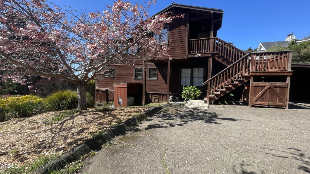 44920 Little Lake Road Mendocino, CA 95460 - Photo 9 of 62 a front view of a house with a yard