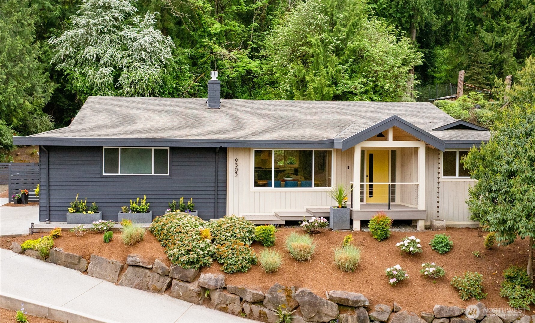 9503 Odin Way Bothell, WA 98011 - Photo 1 of 39 a front view of a house with garden