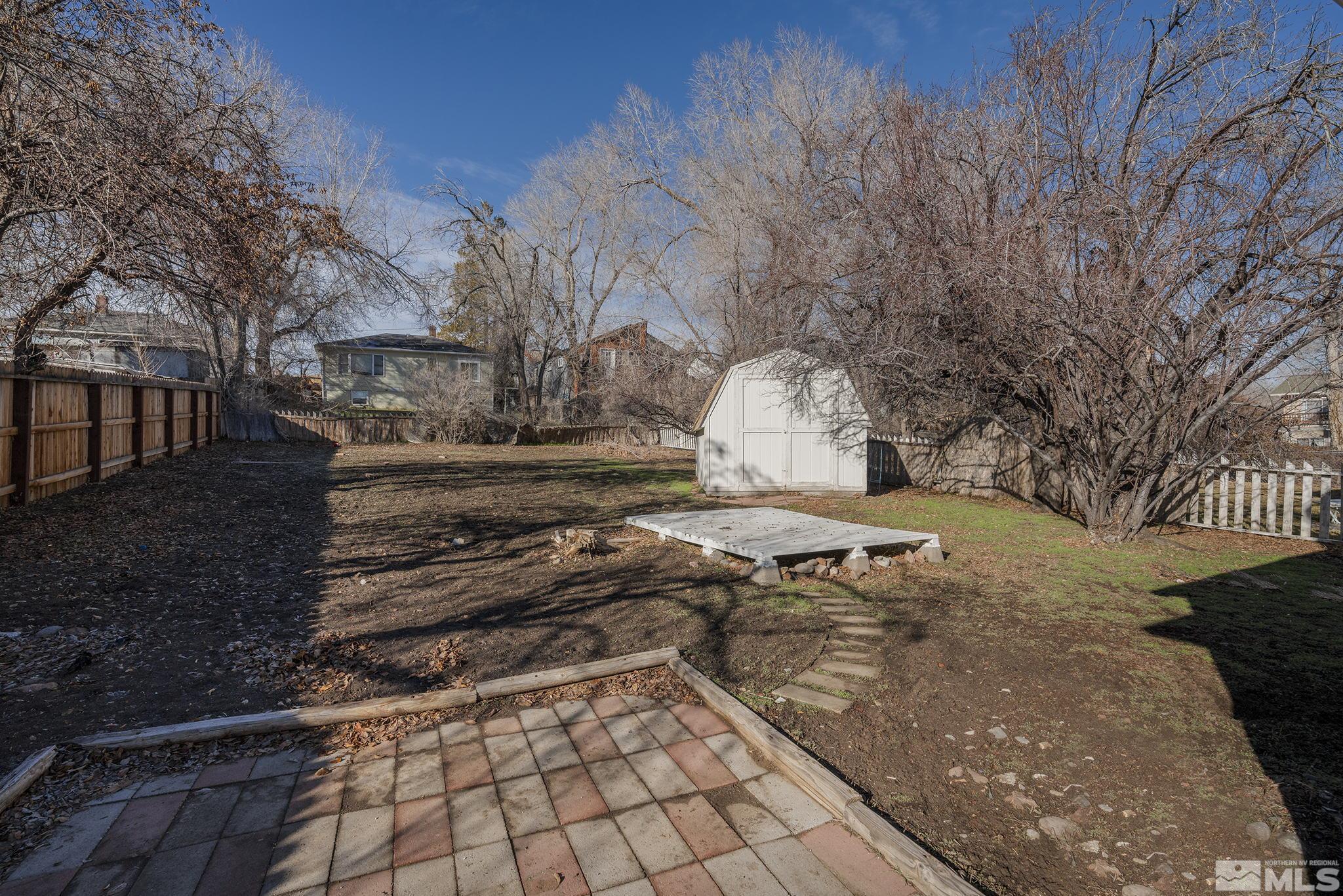 1341 Faland Way Reno, NV 89503 - Photo 15 of 16 a view of a yard with trees