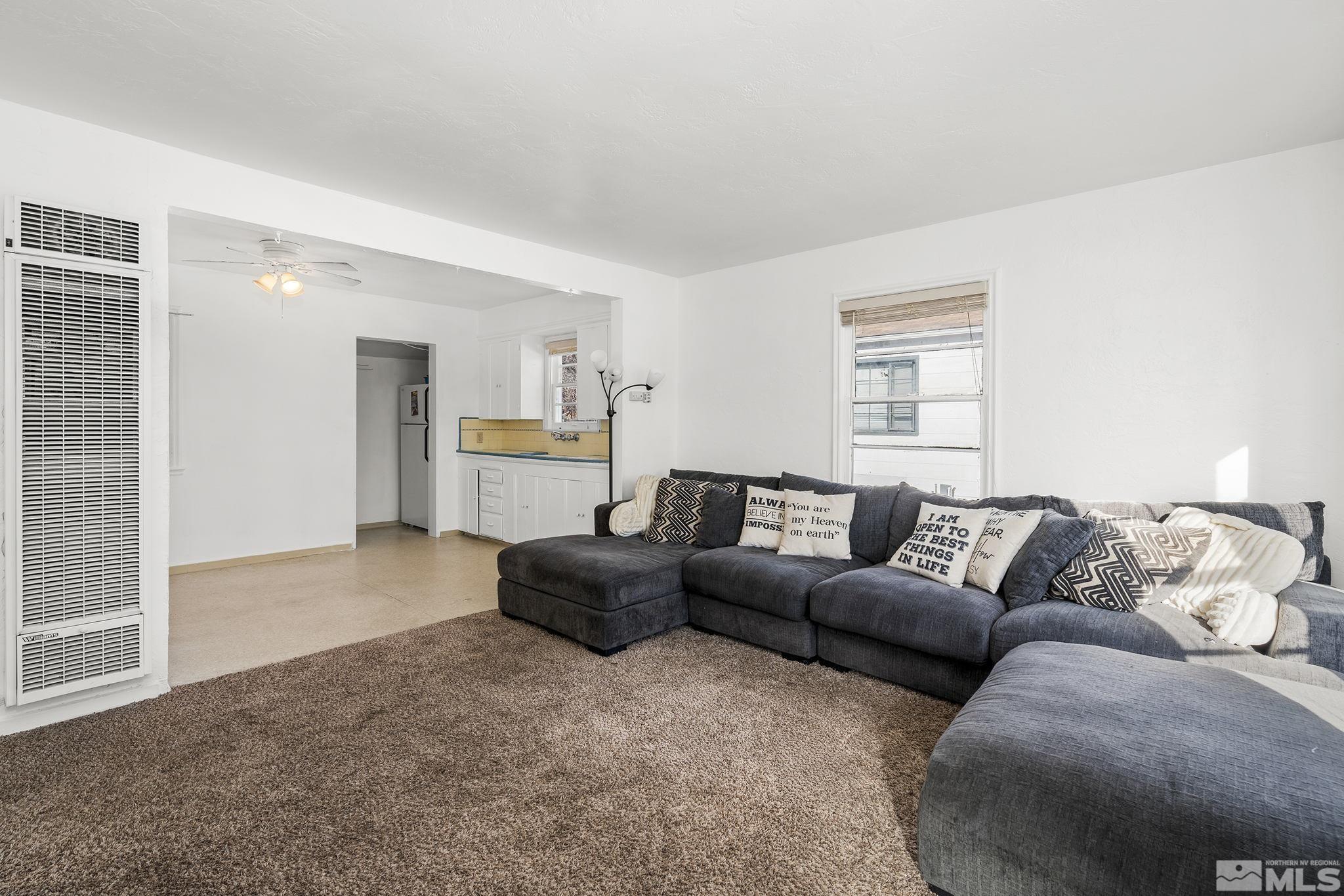 1341 Faland Way Reno, NV 89503 - Photo 3 of 16 a living room with furniture and a couch