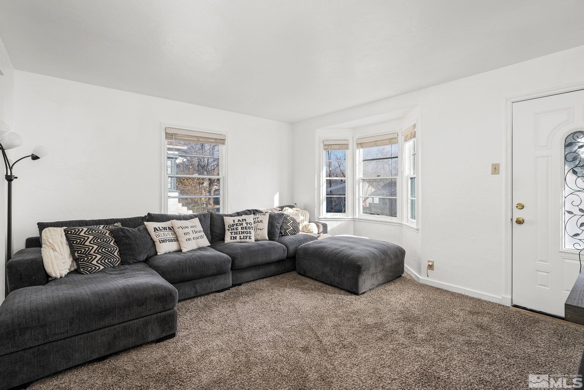 1341 Faland Way Reno, NV 89503 - Photo 4 of 16 a living room with furniture and a window