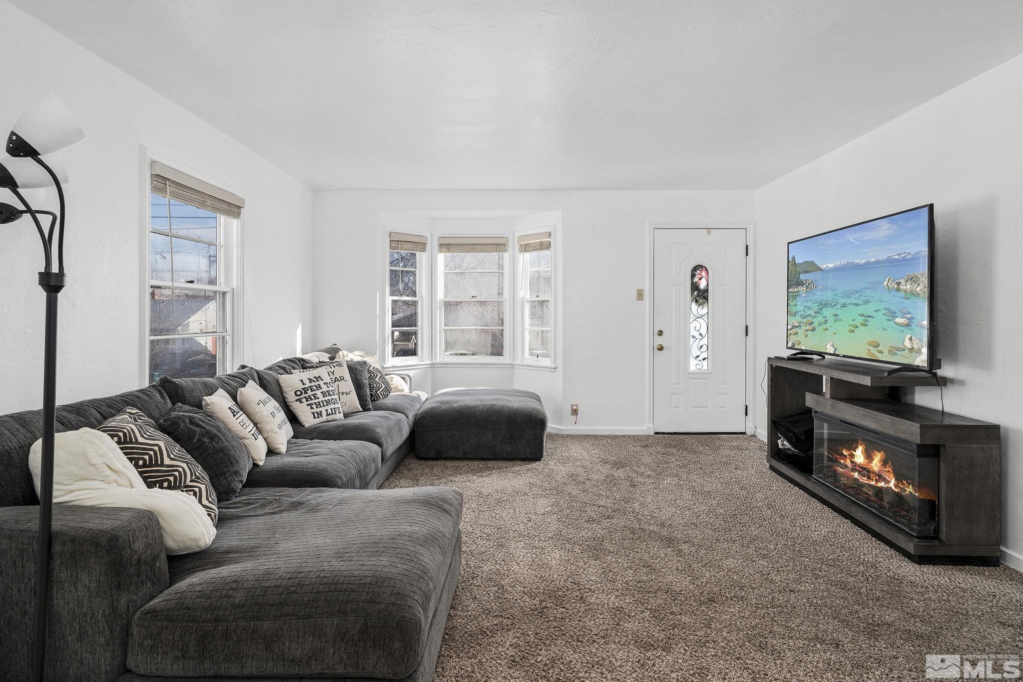 1341 Faland Way Reno, NV 89503 - Photo 5 of 16 a living room with furniture and a flat screen tv