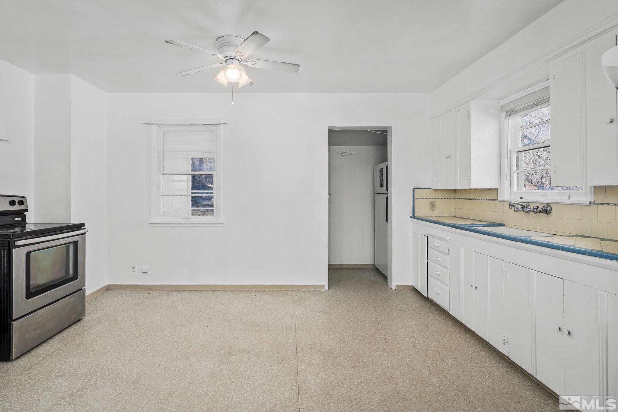 1341 Faland Way Reno, NV 89503 - Photo 6 of 16 a bathroom with a sink and a mirror