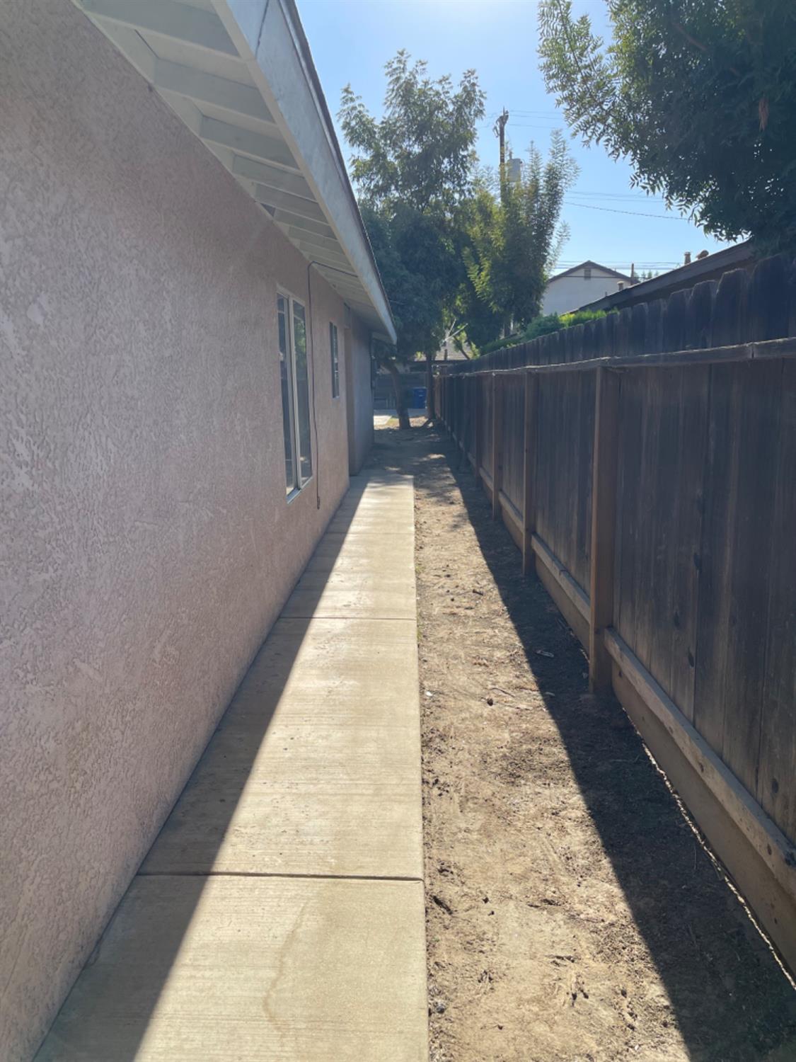 1229 E Street Reedley, CA 93654 - Photo 2 of 25 a view of balcony with hardwood