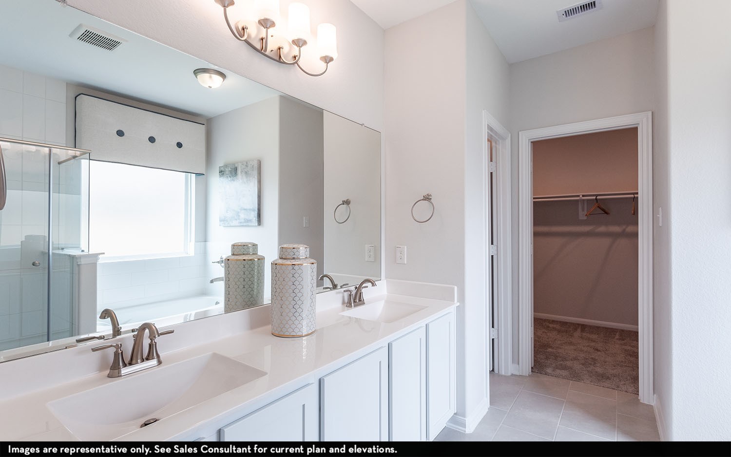 1958 Parks Edge Lane Angleton, TX 77515 - Photo 12 of 20 a bathroom with a sink double vanity and a mirror