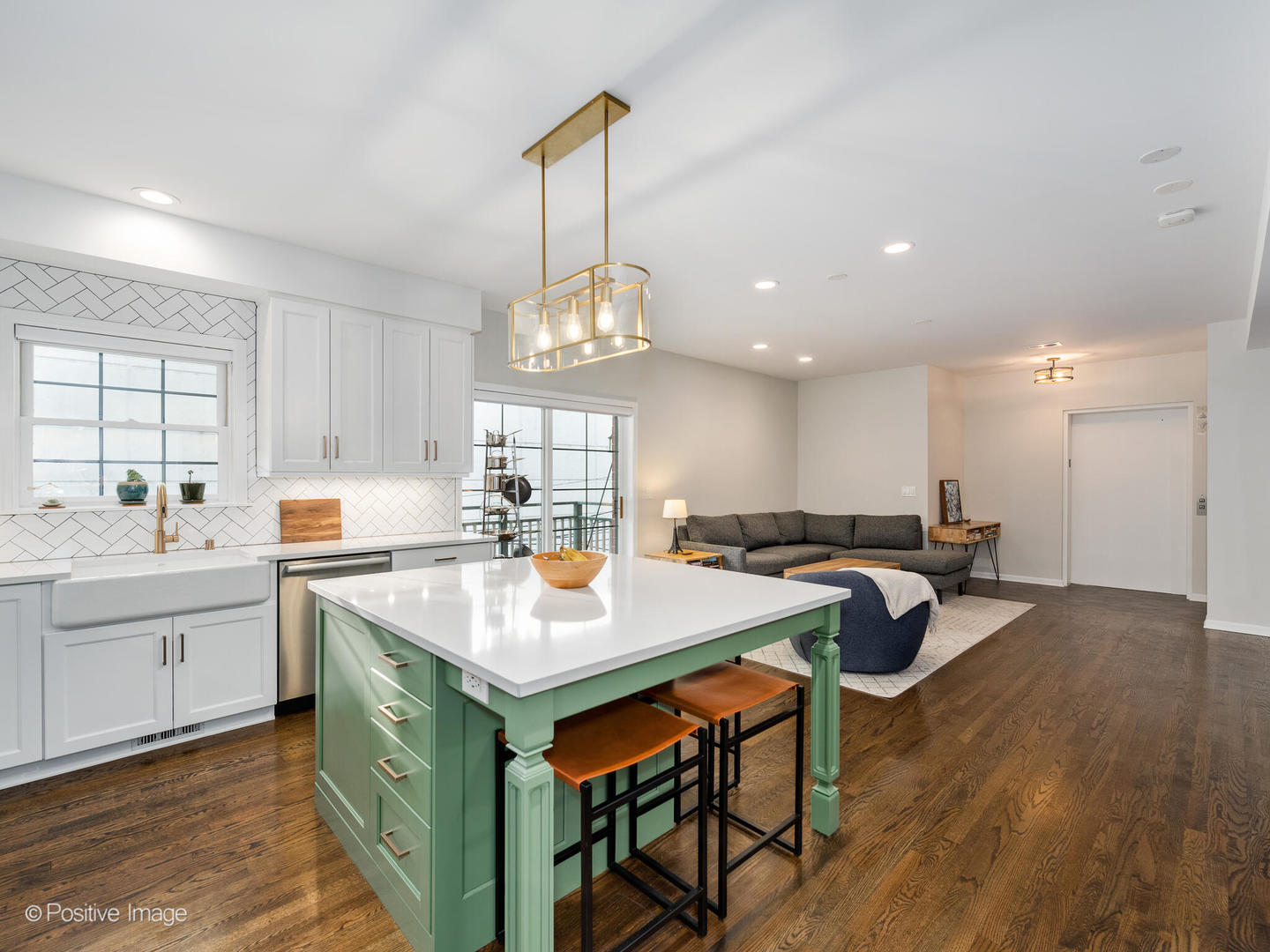 1038 West Monroe Street, Unit 34 Chicago, IL 60607 - Photo 12 of 28 a kitchen with a table chairs sink and cabinets
