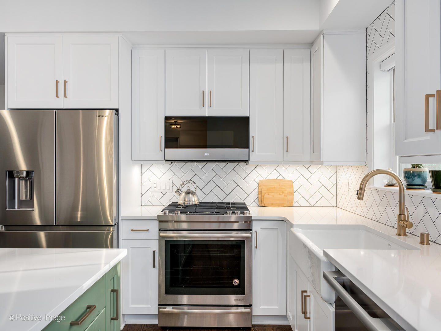 1038 West Monroe Street, Unit 34 Chicago, IL 60607 - Photo 13 of 28 a kitchen with stainless steel appliances a sink a stove a microwave a sink a refrigerator and cabinets