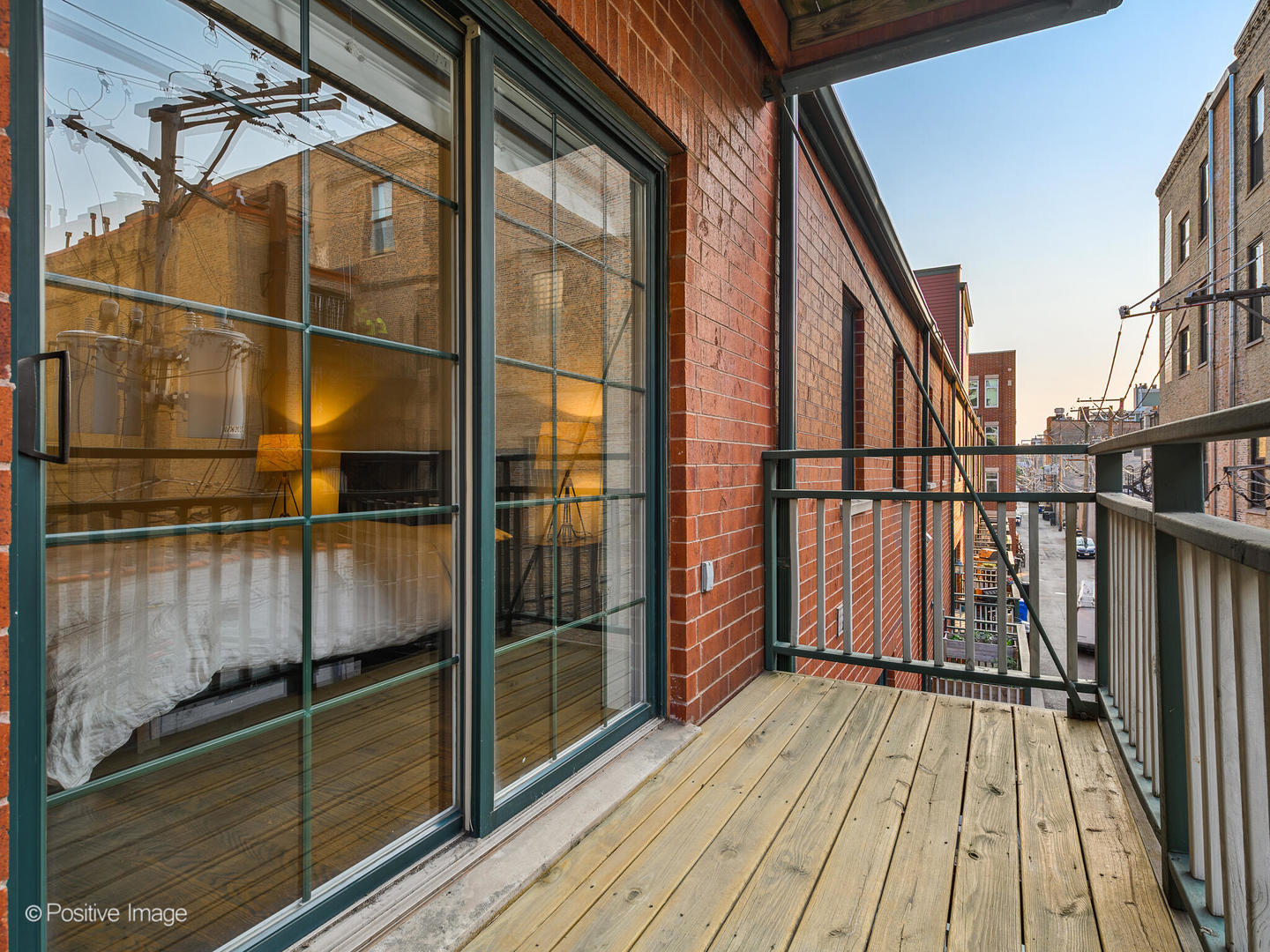 1038 West Monroe Street, Unit 34 Chicago, IL 60607 - Photo 16 of 28 a view of balcony with wooden floor