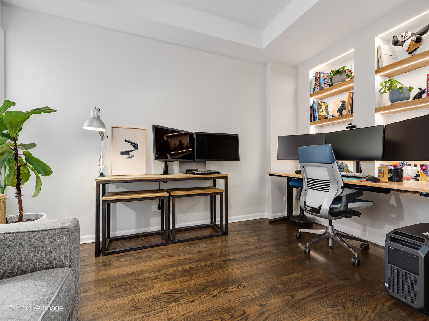 1038 West Monroe Street, Unit 34 Chicago, IL 60607 - Photo 22 of 28 a view of a workspace with furniture and a potted plant