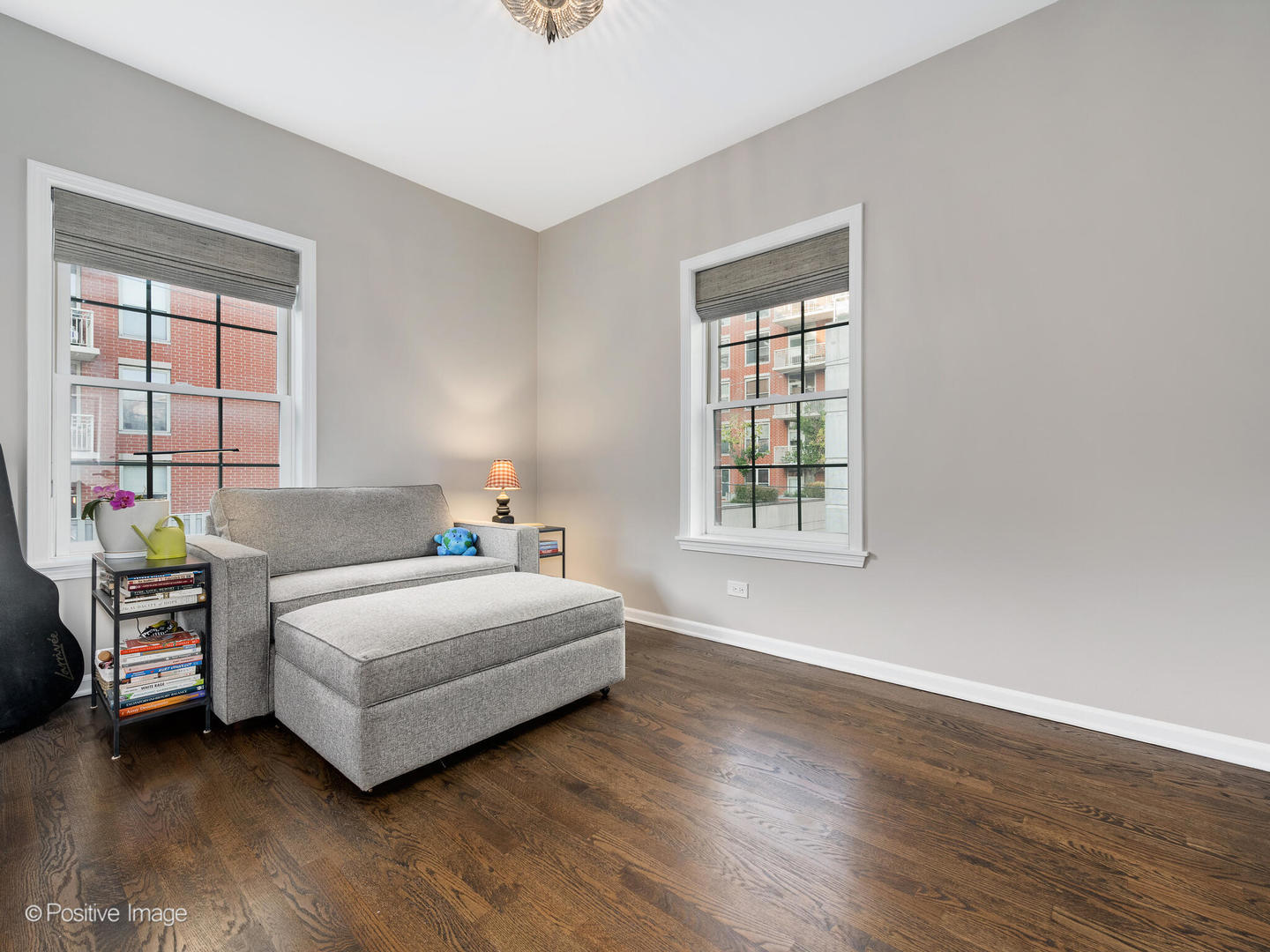 1038 West Monroe Street, Unit 34 Chicago, IL 60607 - Photo 23 of 28 a room with a bed and a window