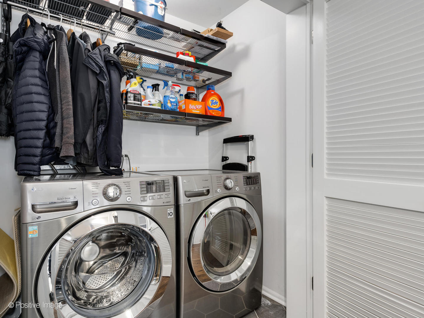 1038 West Monroe Street, Unit 34 Chicago, IL 60607 - Photo 24 of 28 a utility room with dryer and washer