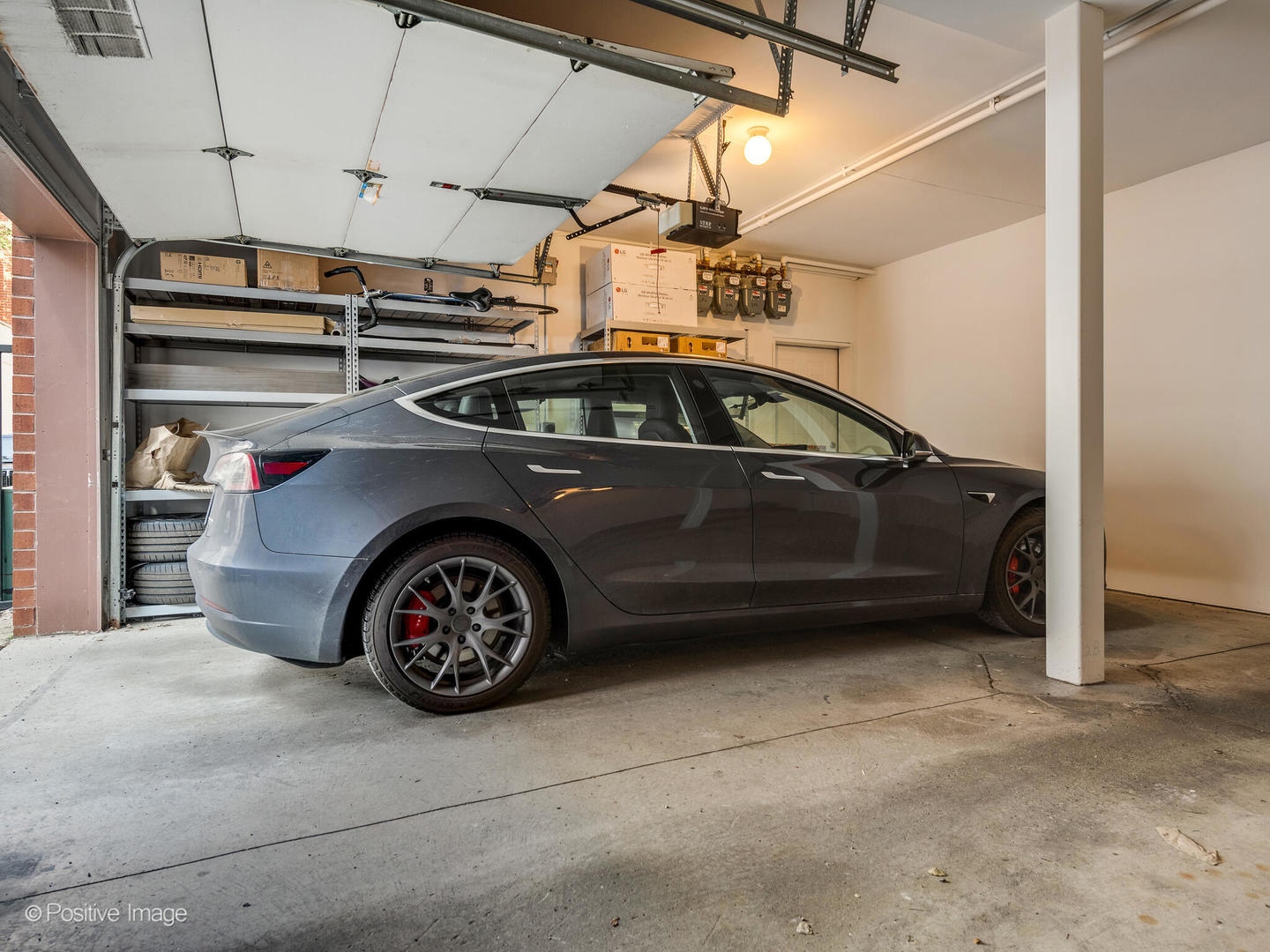 1038 West Monroe Street, Unit 34 Chicago, IL 60607 - Photo 25 of 28 a car parked in a garage