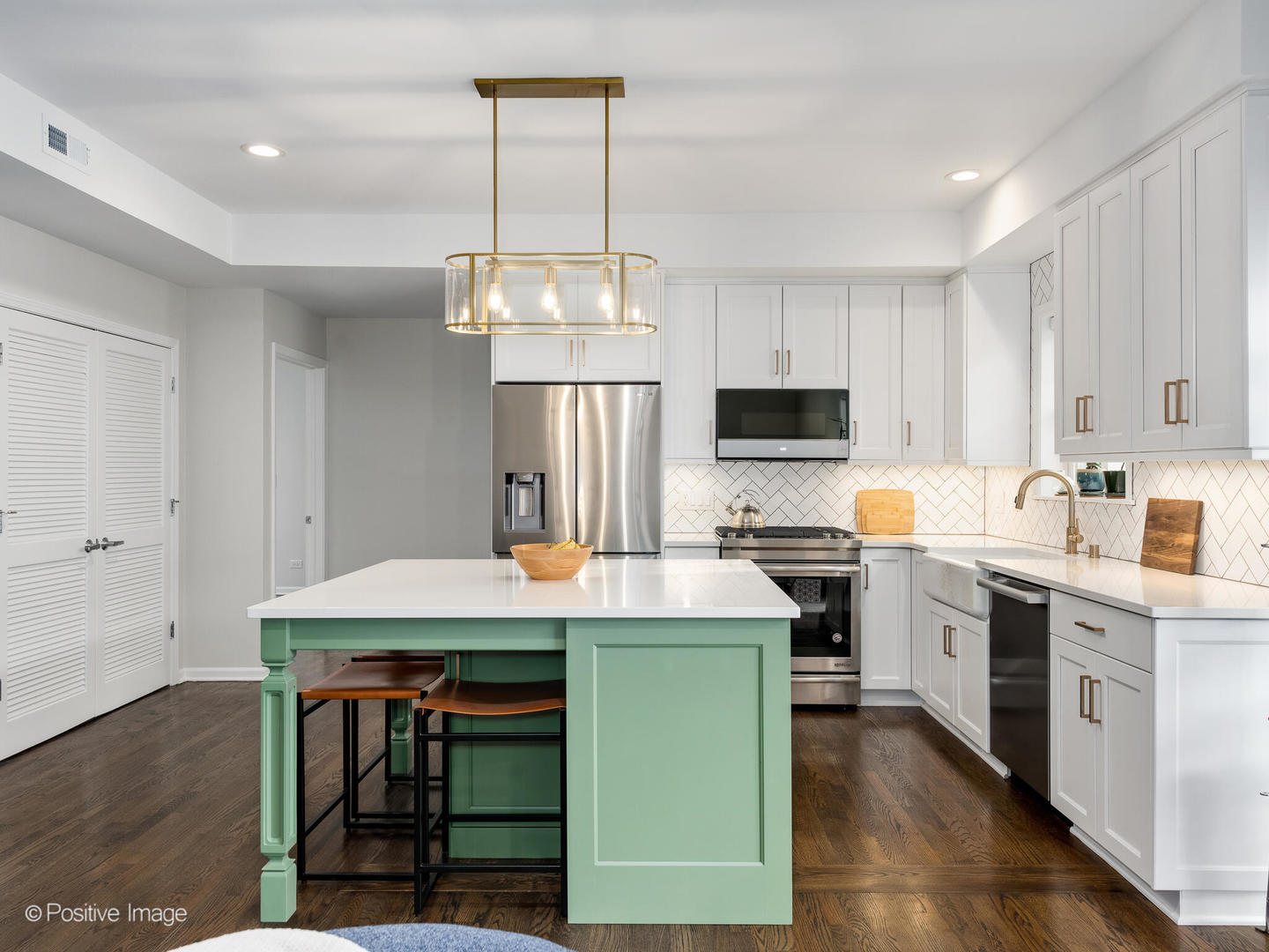 1038 West Monroe Street, Unit 34 Chicago, IL 60607 - Photo 8 of 28 a kitchen that has a cabinets and a stove top oven