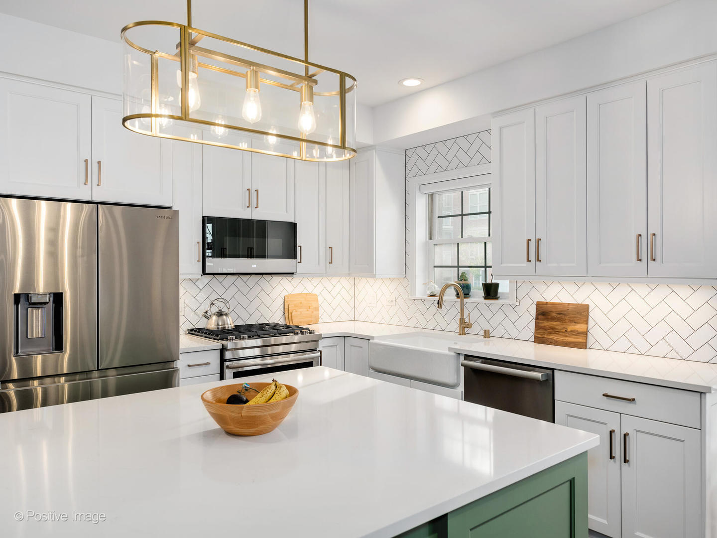 1038 West Monroe Street, Unit 34 Chicago, IL 60607 - Photo 9 of 28 a kitchen with stainless steel appliances a counter space and cabinets