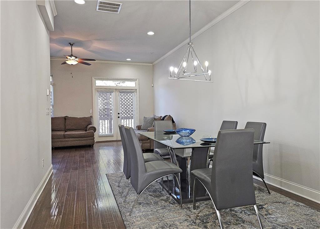 1212 Stone Castle Circle Smyrna, GA 30080 - Photo 12 of 39 a view of a dining room with furniture and chandelier