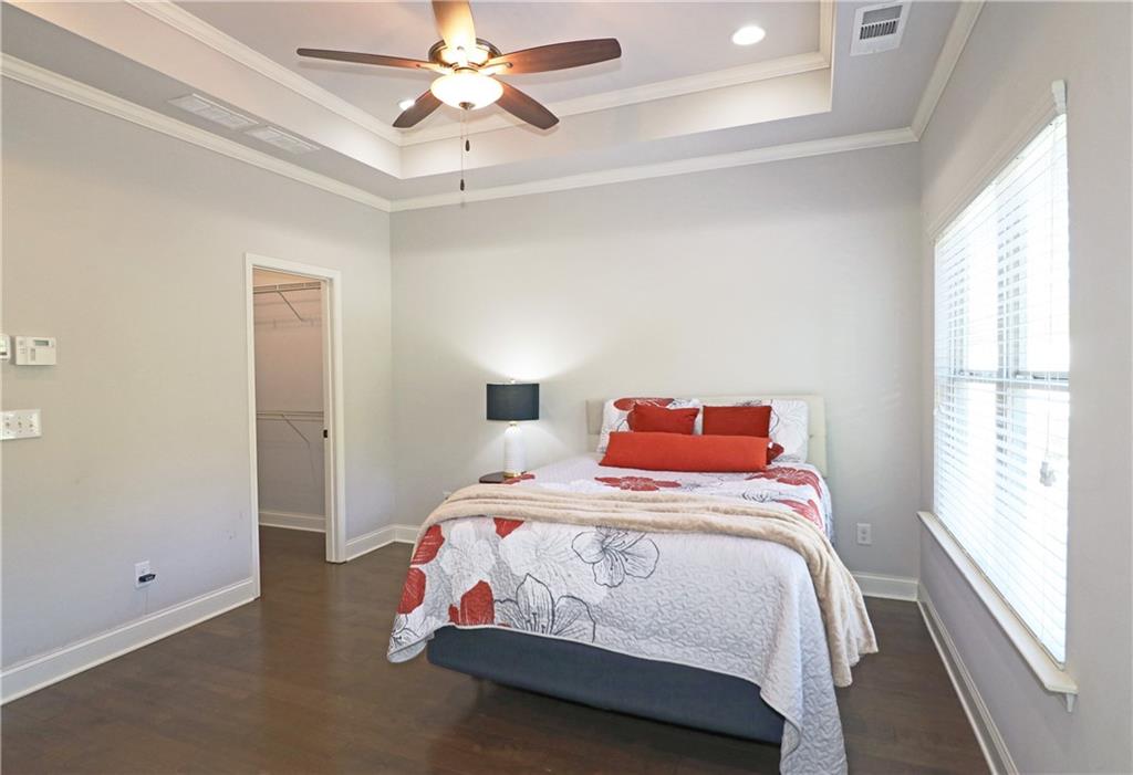 1212 Stone Castle Circle Smyrna, GA 30080 - Photo 20 of 39 a bedroom with a bed and a window