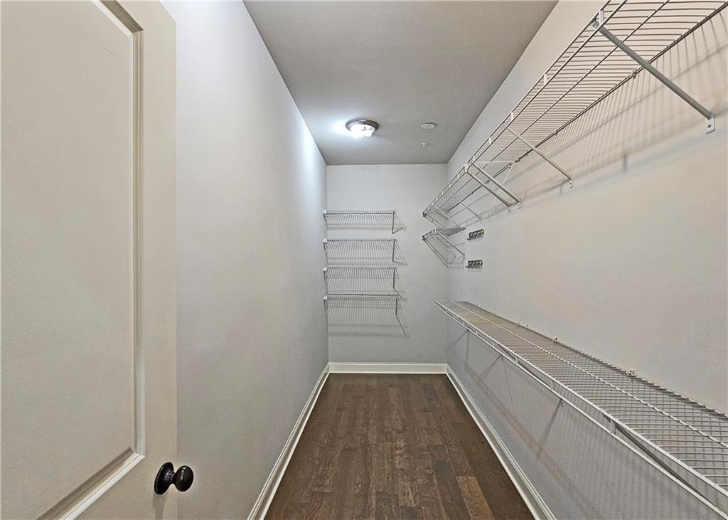 1212 Stone Castle Circle Smyrna, GA 30080 - Photo 21 of 39 a view of a walk in closet