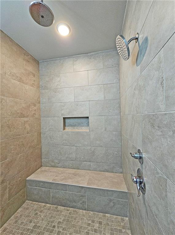 1212 Stone Castle Circle Smyrna, GA 30080 - Photo 24 of 39 a bathroom with a shower
