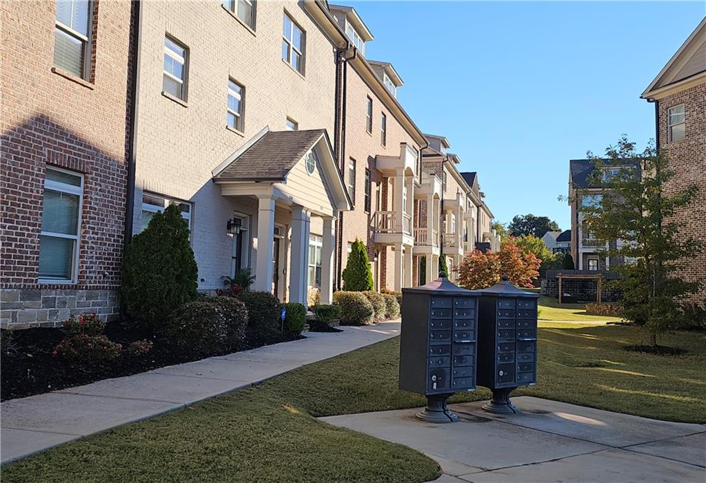 1212 Stone Castle Circle Smyrna, GA 30080 - Photo 37 of 39 a front view of a house with a yard