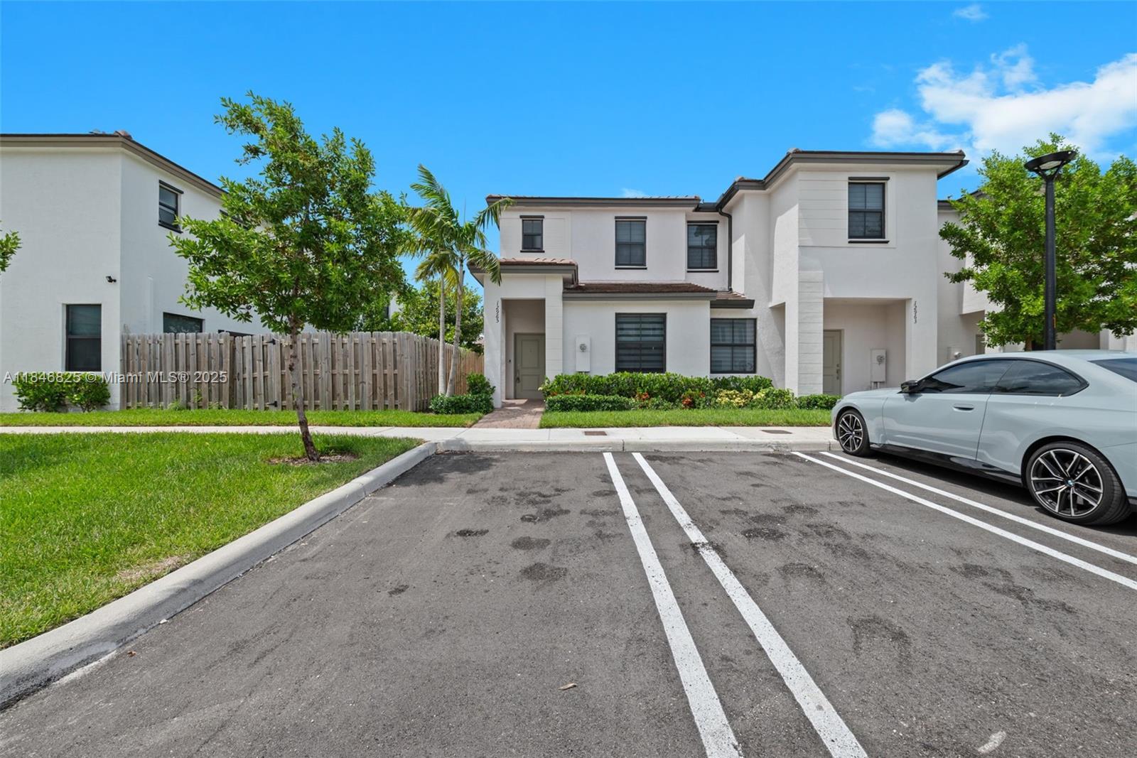 a car parked in front of a house