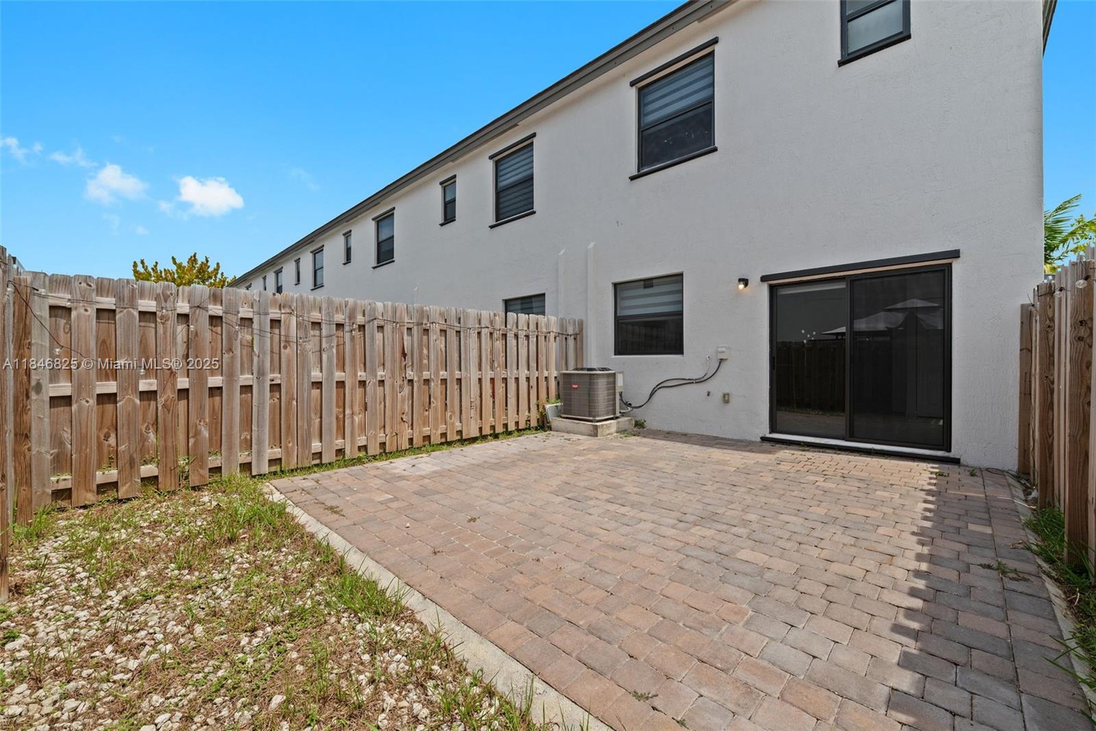 12965 Southwest 233rd Terrace Homestead, FL 33032 - Photo 25 of 25 a view of a backyard of a house