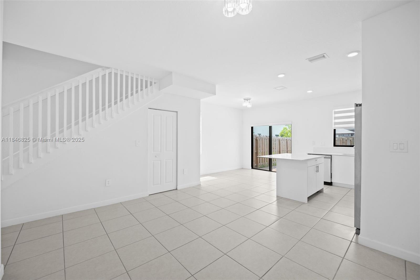 12965 Southwest 233rd Terrace Homestead, FL 33032 - Photo 5 of 25 a view of an empty room and window