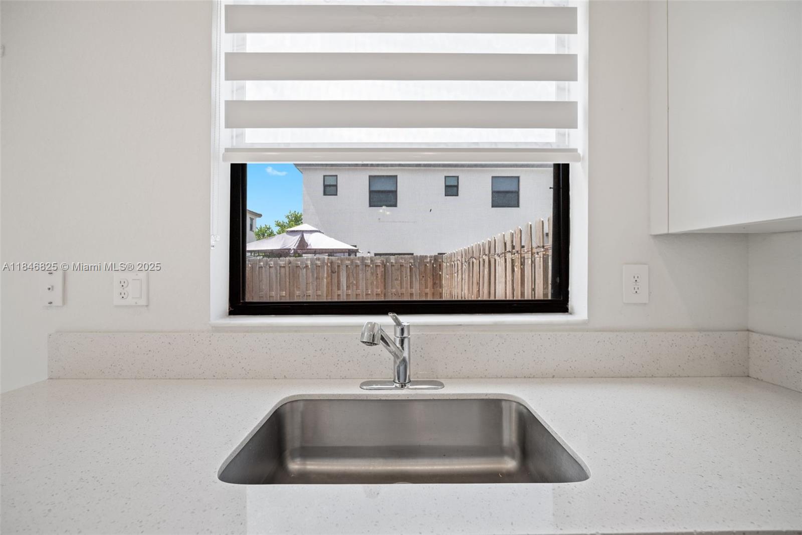 12965 Southwest 233rd Terrace Homestead, FL 33032 - Photo 10 of 25 a sink with window