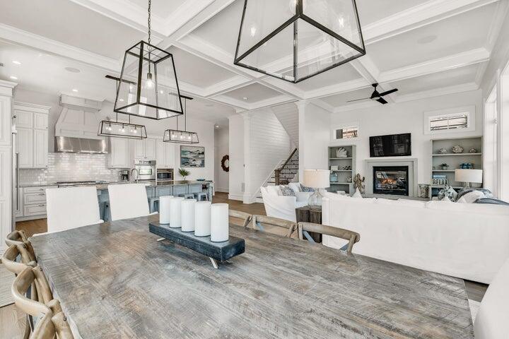 410 Beachfront Trail Santa Rosa Beach, FL 32459 - Photo 15 of 102 a living room with fireplace furniture and a flat screen tv
