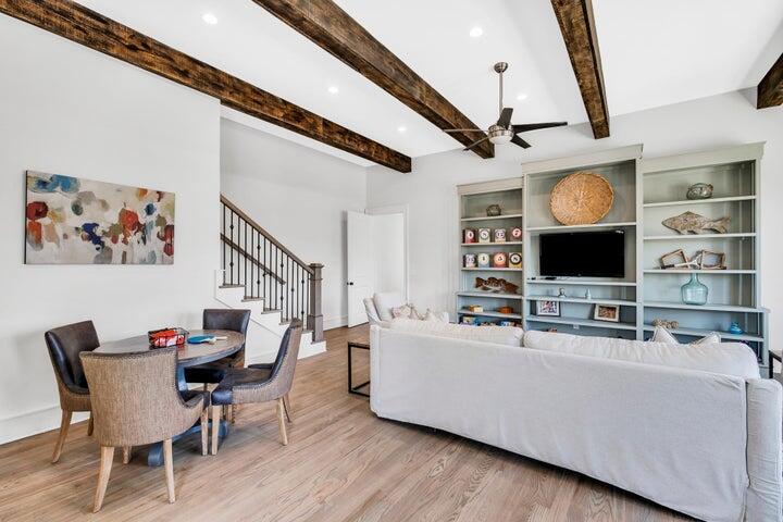 410 Beachfront Trail Santa Rosa Beach, FL 32459 - Photo 36 of 102 a living room with furniture and a flat screen tv