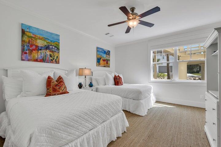 410 Beachfront Trail Santa Rosa Beach, FL 32459 - Photo 51 of 102 a bedroom with two beds and painting on the wall