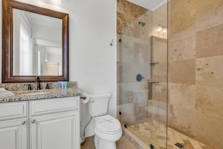 410 Beachfront Trail Santa Rosa Beach, FL 32459 - Photo 63 of 102 a bathroom with a granite countertop sink toilet and shower