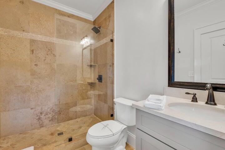410 Beachfront Trail Santa Rosa Beach, FL 32459 - Photo 72 of 102 a bathroom with a sink a toilet and shower