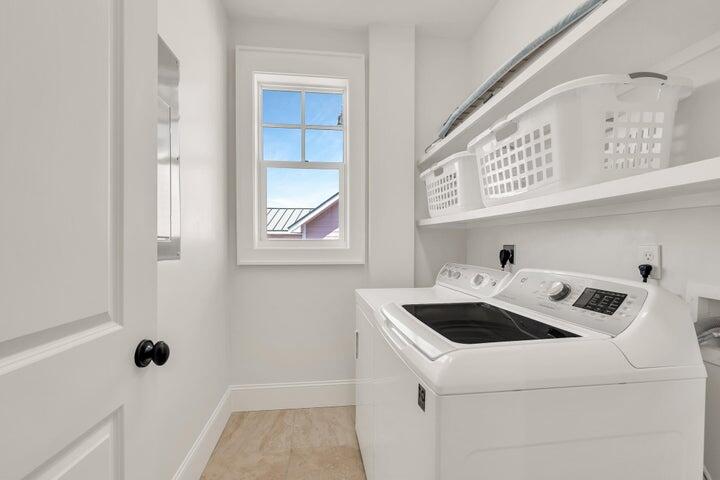 410 Beachfront Trail Santa Rosa Beach, FL 32459 - Photo 73 of 102 a utility room with dryer and washer