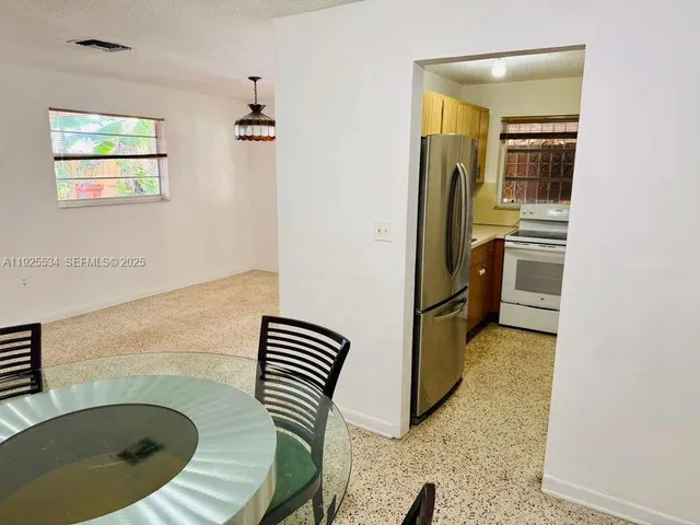 a view of kitchen and bathroom
