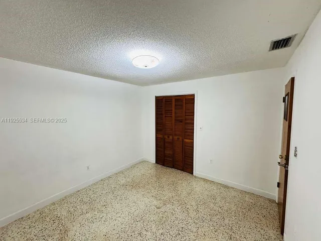an empty room with a natural light