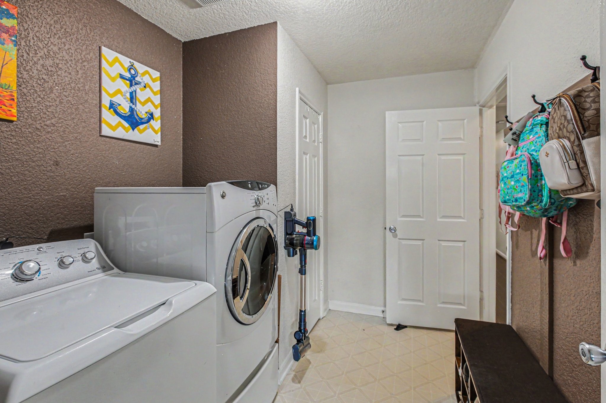 2903 Swift Brook Glen Way Spring, TX 77389 - Photo 22 of 30 Spacious laundry room with a storage closet and access to the garage.