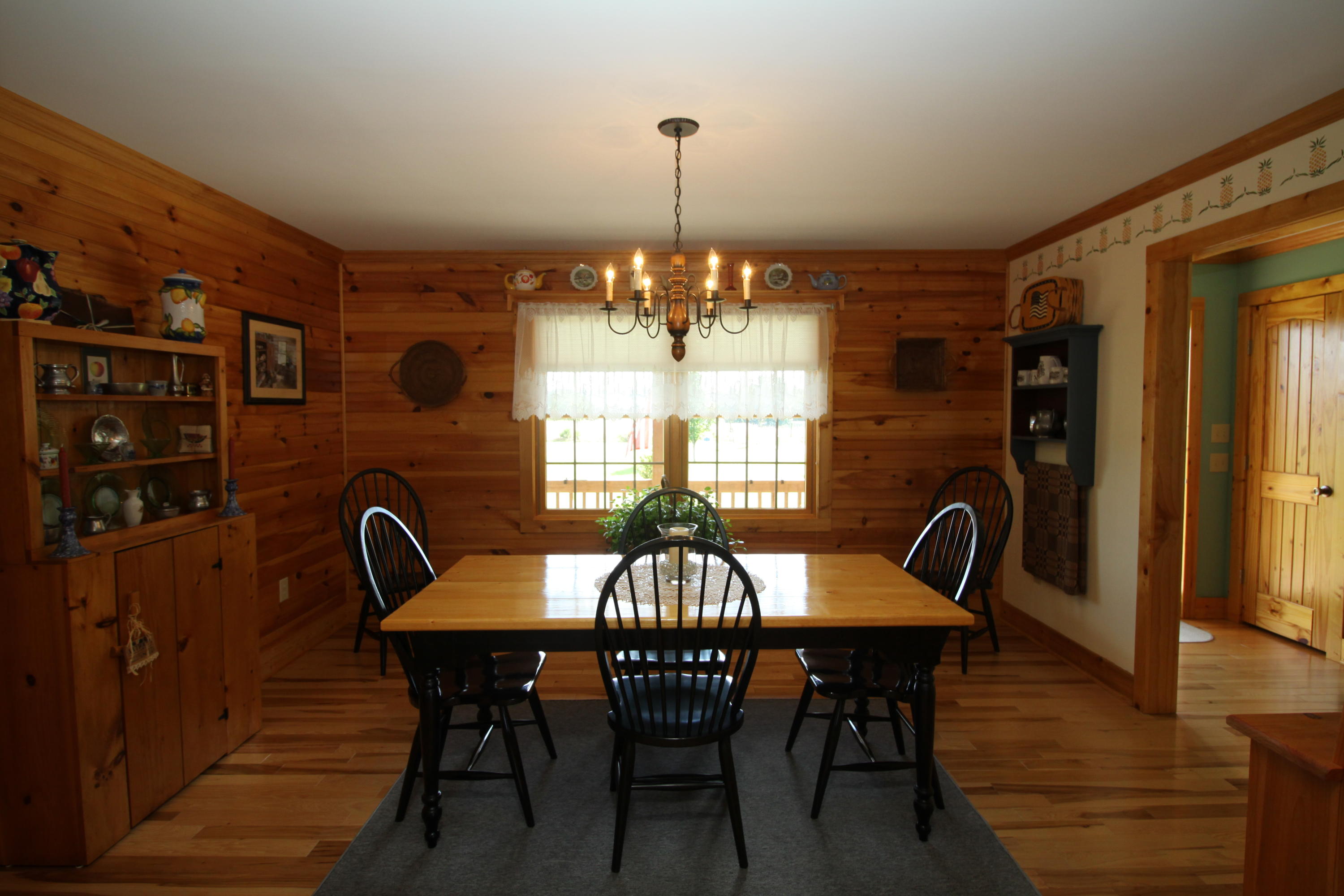 2615 Hatchett Road Penhook, VA 24137 - Photo 8 of 38 a view of a dining room with furniture window and wooden floor