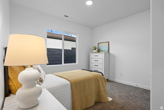 1624 South Staircase Way, Unit 4183 Washington, UT 84780 - Photo 26 of 47 Bedroom featuring light gray wall paint, a single window with a black-framed exterior, recessed ceiling lighting, and dark gray carpet flooring