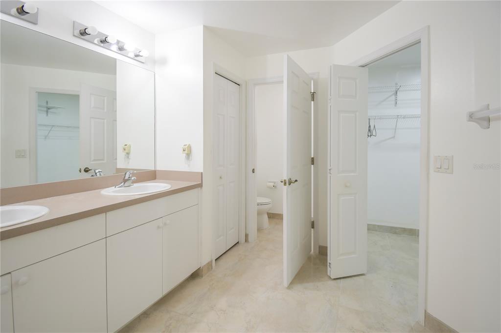 4913 Cromey Road North Port, FL 34288 - Photo 16 of 36 a spacious bathroom with a shower and a sink