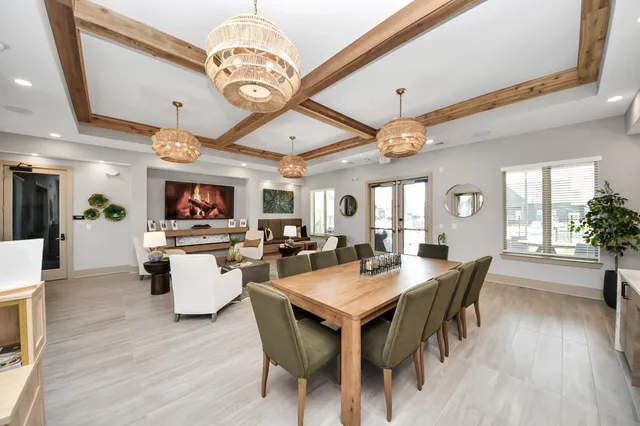 a bathroom with a granite countertop sink mirror bathtub and shower
