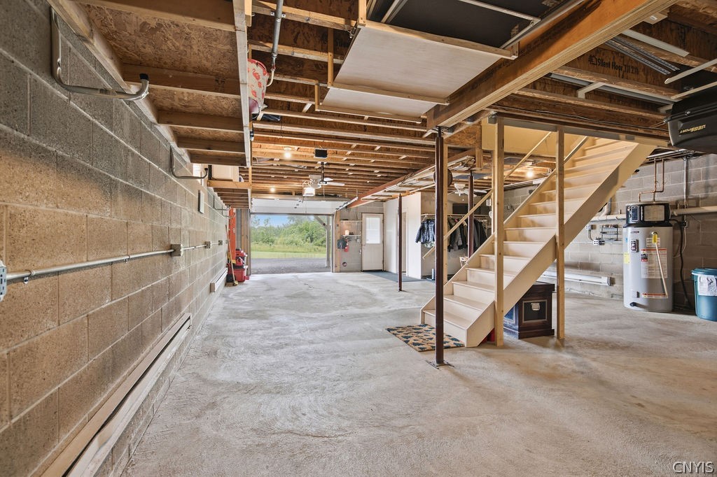 321 West Lake Road Oswego, NY 13126 - Photo 33 of 49 A spacious garage offering easy access with stairs