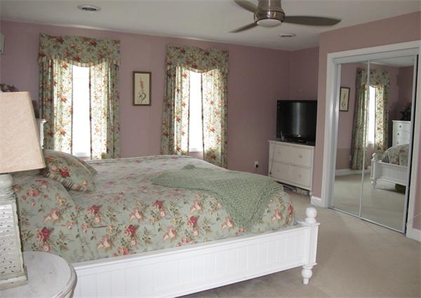 223 Wauwinet Road Barre, MA 01005 - Photo 16 of 24 a bedroom with a bed and a television