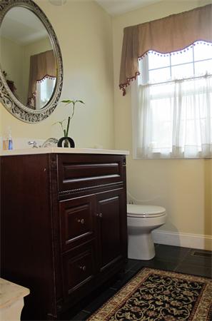 223 Wauwinet Road Barre, MA 01005 - Photo 8 of 24 a bathroom with a toilet a sink and a mirror