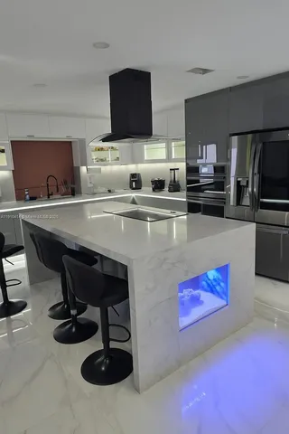 a bedroom with a bed and cabinets