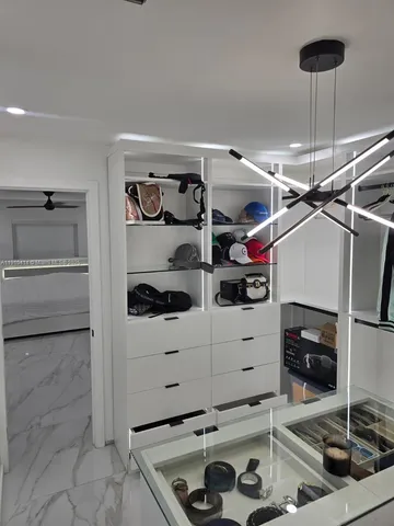 a bathroom with a sink toilet and mirror